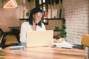 woman creating social media posts for her restaurant