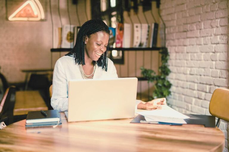 woman creating social media posts for her restaurant